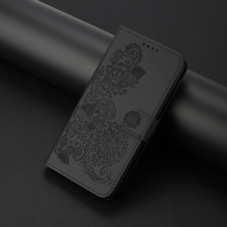 For iPhone 16 Plus Datura Flower Embossed Flip Leather Phone Case(Black) - iPhone 16 Plus Cases by PMC TechLife | Online Shopping South Africa | PMC TechLife | Buy Now Pay Later Mobicred
