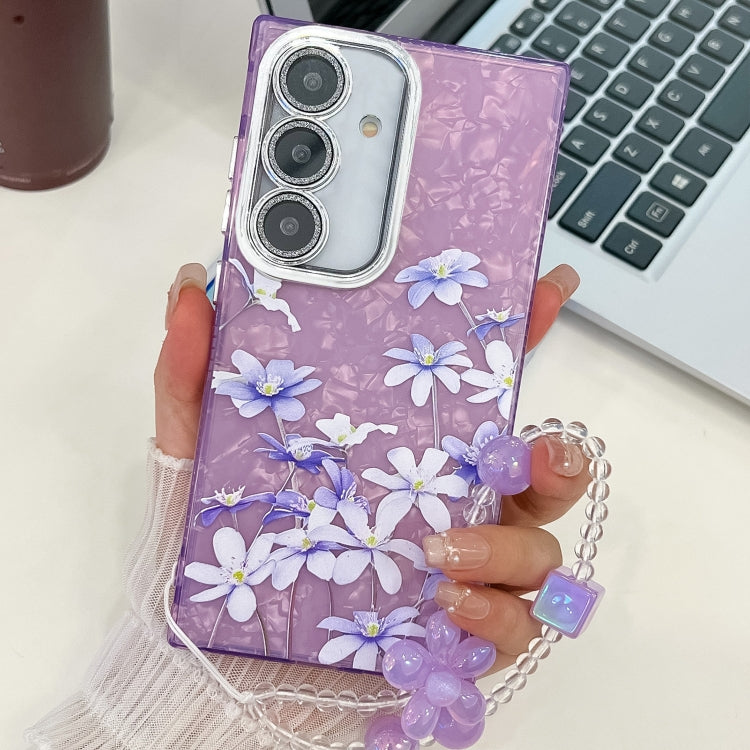 For Samsung Galaxy S25+ 5G Electroplating Flowers Plants Texture Wristband TPU Phone Case(Lilac Flowers FL16) - Galaxy S25+ 5G Cases by PMC Jewellery | Online Shopping South Africa | PMC Jewellery | Buy Now Pay Later Mobicred